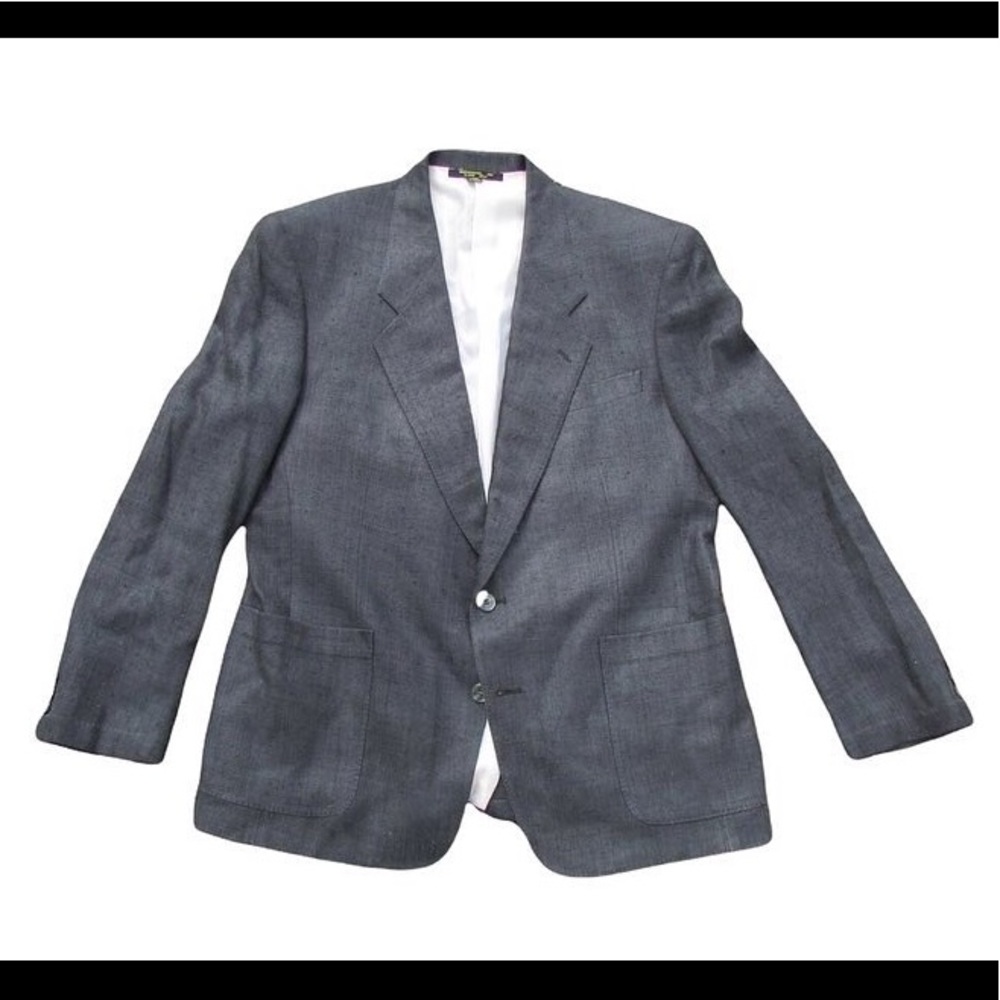 Neil’s grey blazer